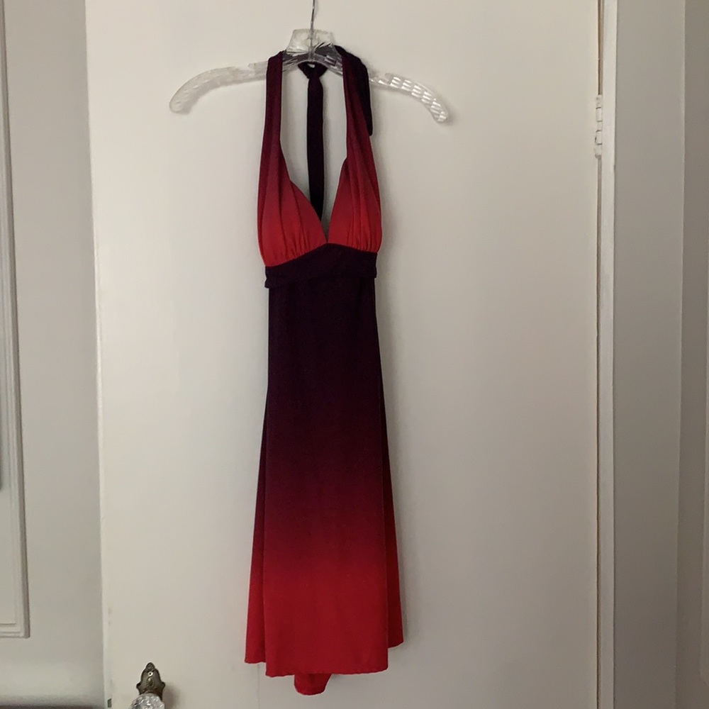 Jordan Taylor reddish pinkish and purple halter mini dress.